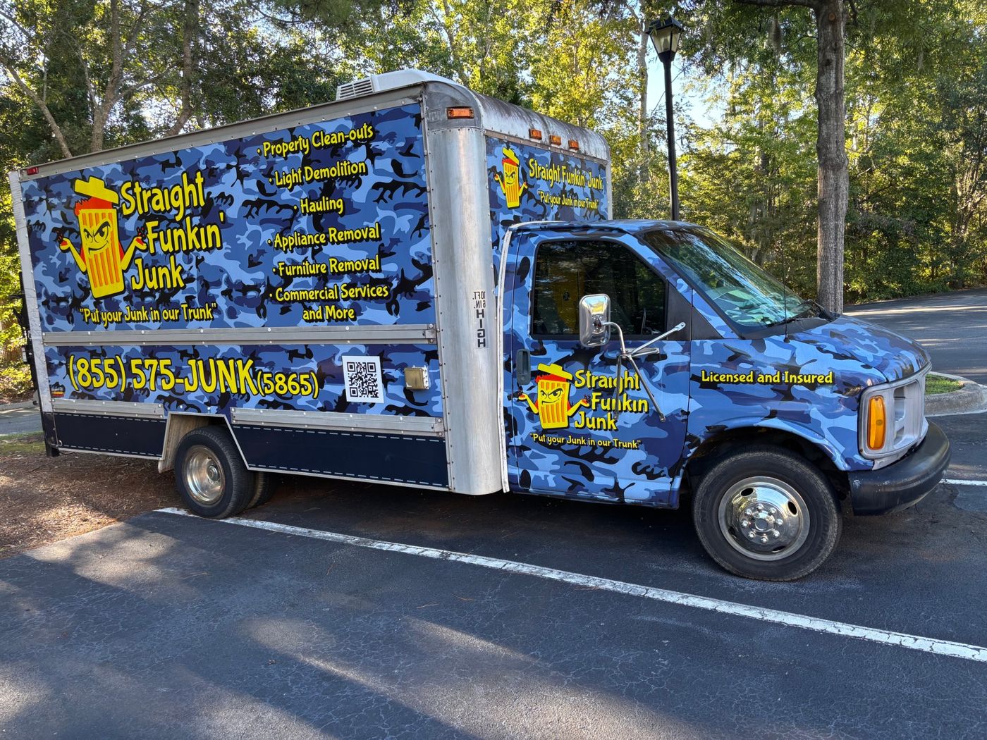 Straight Funkin' Junk blue camo box truck with Junky the mascot, parked in Summerville SC